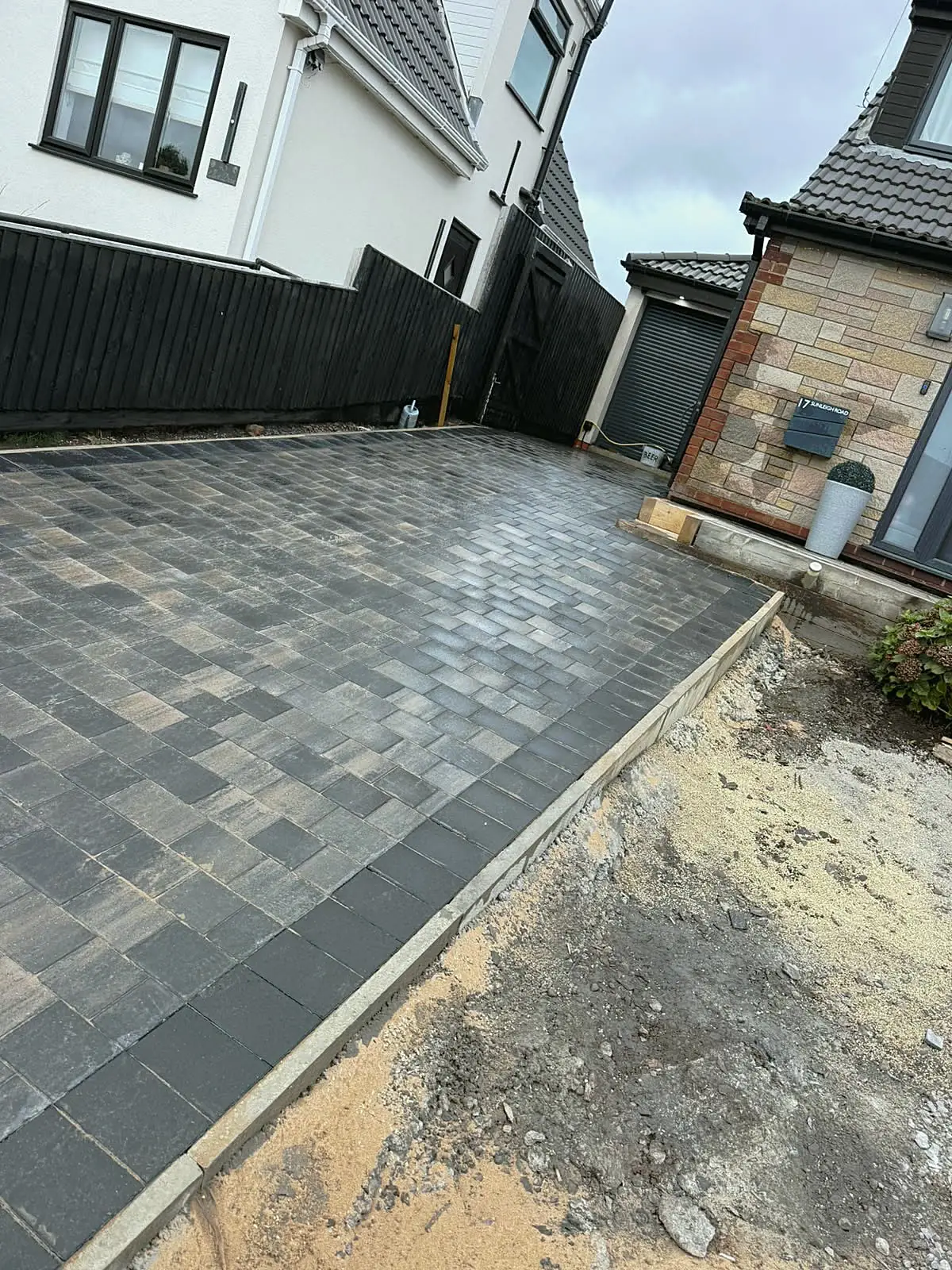 Block paved driveway with charcoal edging